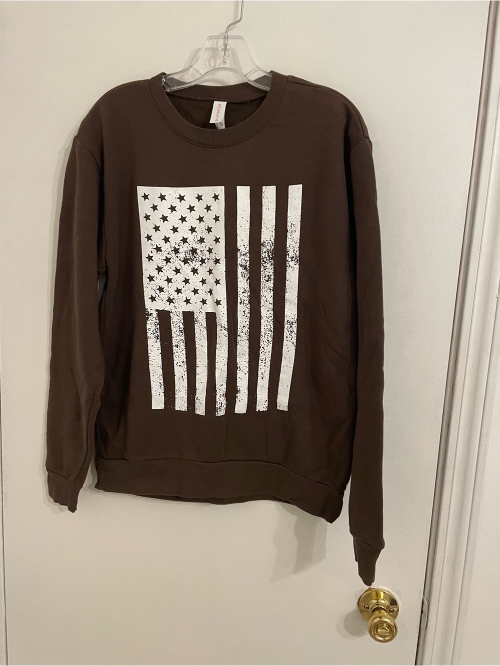 Alternative Men's Brown Crewneck Sweater with Distressed White Flag Graphic
